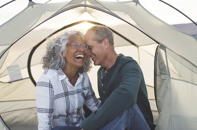 Elderly couple camping